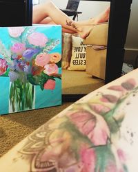 Close-up of woman hand holding flowers