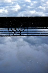 Scenic view of lake against sky during winter