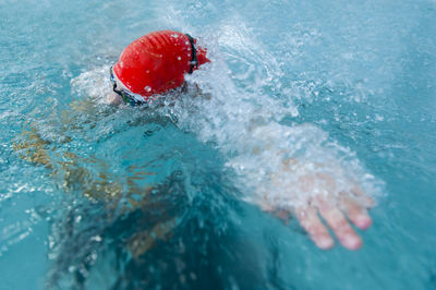 High angle view of person swimming in pool