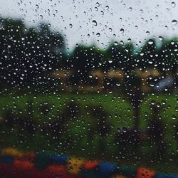 Close-up of water drops on glass