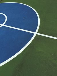 Close-up of road against blue sky