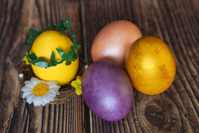 Close-up of yellow eggs on table