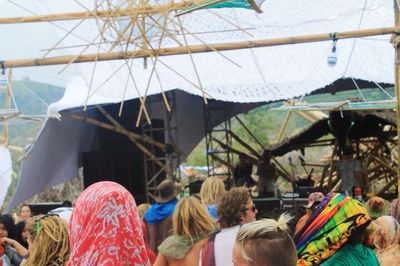 Rear view of people enjoying at dance festival