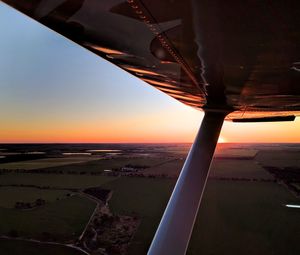 View of airport runway at sunset