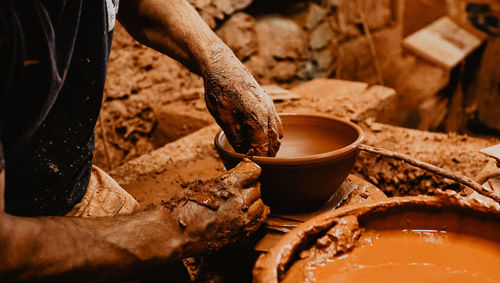 Close-up of man preparing food