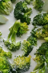 High angle view of broccoli with coconut milk