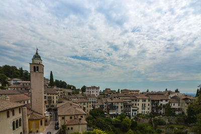 Town against sky in city