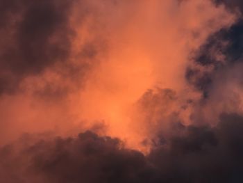 Low angle view of cloudy sky during sunset