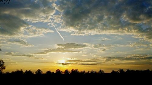 Scenic view of dramatic sky during sunset