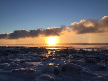 Scenic view of sea at sunset