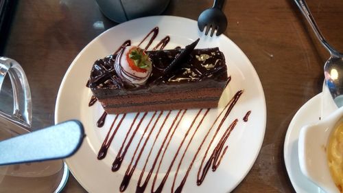 High angle view of cake in plate on table