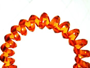 Close-up of row over white background