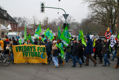 Group of people on street in city