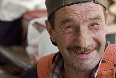 Close-up portrait of smiling mature man 