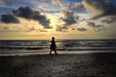 Scenic view of sea at sunset