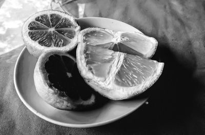 Close-up of fruit in plate on table