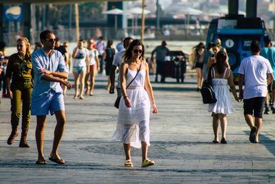 Group of people walking in city