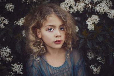 Portrait of girl with flowers