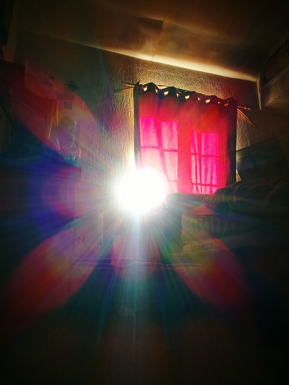 LOW ANGLE VIEW OF ILLUMINATED BRIGHT SUN IN SUNLIGHT