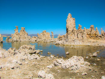 Rock formations against blue sky