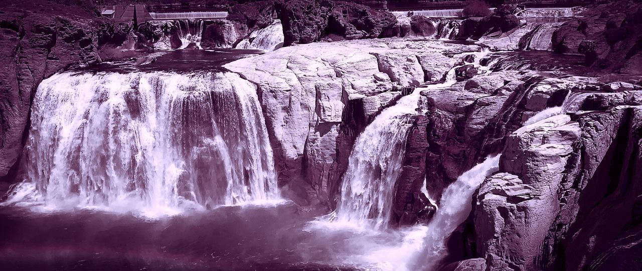 VIEW OF WATERFALL WITH ROCKS