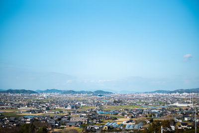 High angle shot of townscape against sky