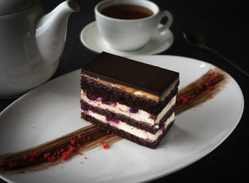 High angle view of cake and coffee on table