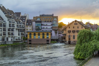 Idyllic waterside impression of strasbourg, a city at the alsace region in france at evening time