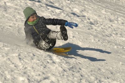 Full length of a boy in snow