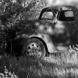 Close-up of abandoned car