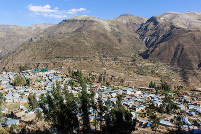 High angle view of trees and mountains against sky