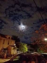 Low angle view of illuminated city at night