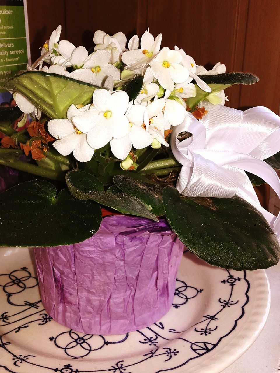 flower, freshness, indoors, petal, vase, table, white color, high angle view, fragility, flower head, close-up, leaf, bouquet, flower arrangement, bunch of flowers, beauty in nature, still life, decoration, growth, plant