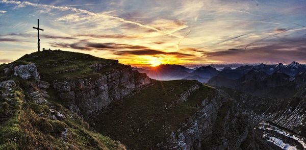 Scenic view of mountains against sky during sunset