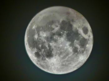Low angle view of moon against sky at night