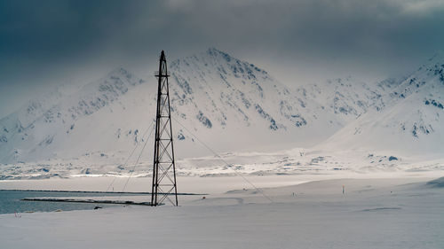 Scenic view of landscape against sky during winter