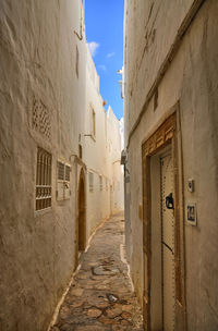 Narrow alley along buildings