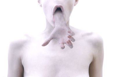 Digitally generated image of hand coming out from woman mouth