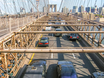 Cars in city against sky