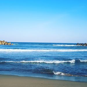 Scenic view of sea against clear sky