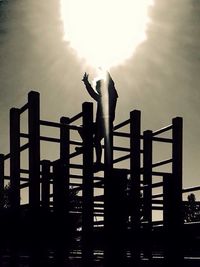 Low angle view of built structure against sunset sky