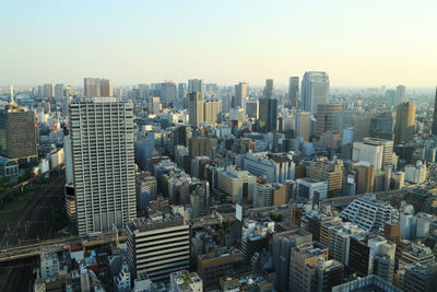 High angle view of modern buildings against clear sky