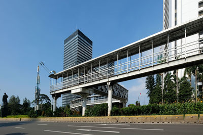 View of bridge against clear blue sky