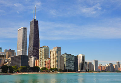 View of buildings in city at waterfront