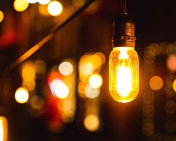 Close-up of illuminated light bulb