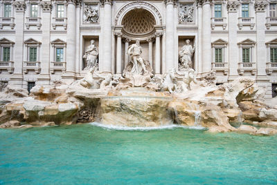 Fountain in front of historical building