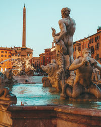 Statue of buildings against the sky