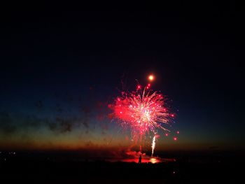 Firework display at night