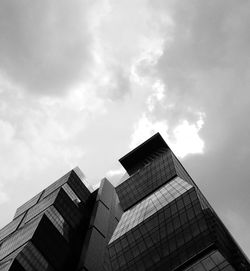 Low angle view of office building against sky