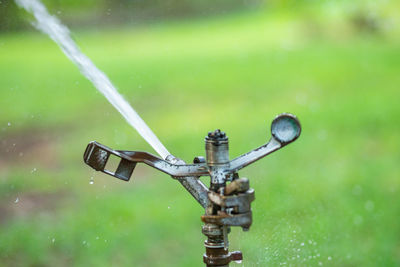 Close-up of water splashing from faucet